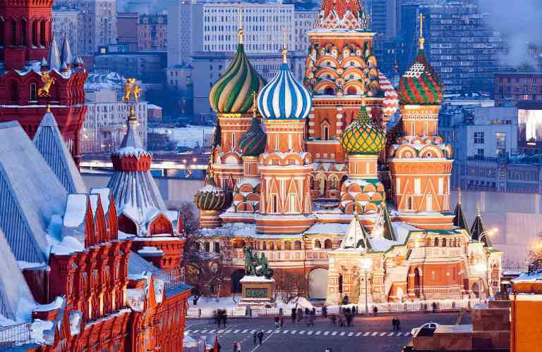 a large building with colorful domes